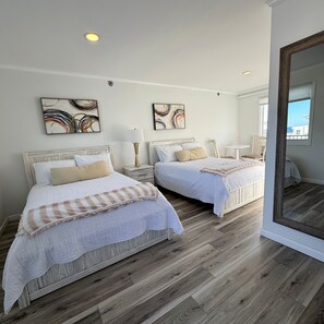 Standaard kamer, 2 tweepersoonsbedden | Pillowtop-bedden, individueel gedecoreerd, individueel gemeubileerd