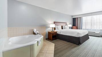 Suite, 1 King Bed, Non Smoking, Jetted Tub | Desk, blackout drapes, iron/ironing board, free cribs/infant beds
