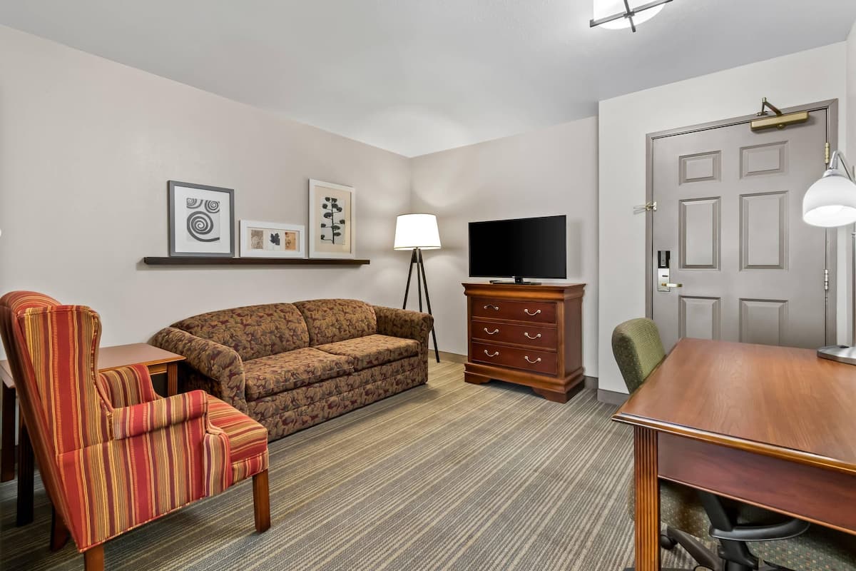 Suite, 1 Bedroom, Non Smoking | 1 bedroom, desk, blackout curtains, iron/ironing board