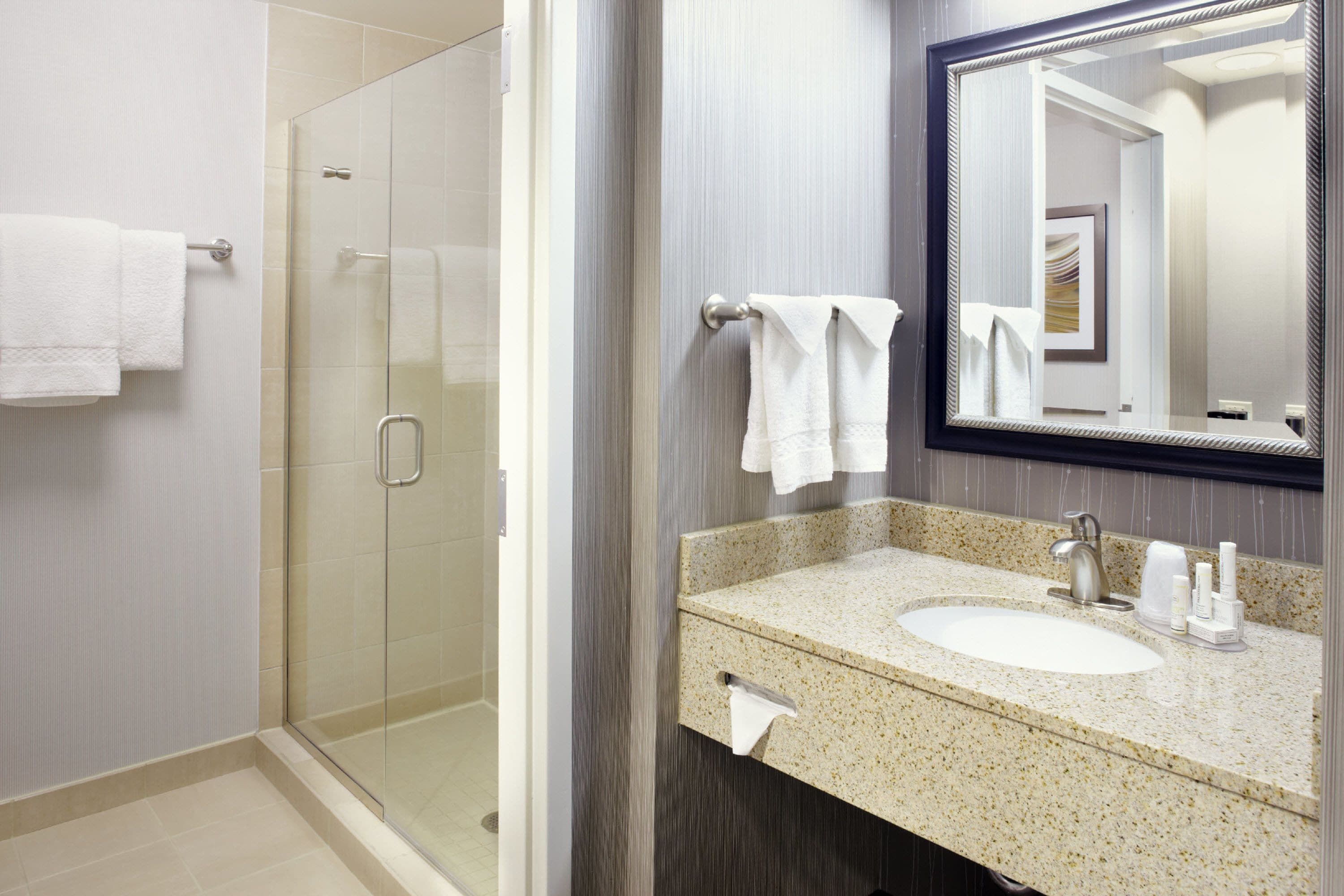 eco-friendly toiletries, hair dryer, towels