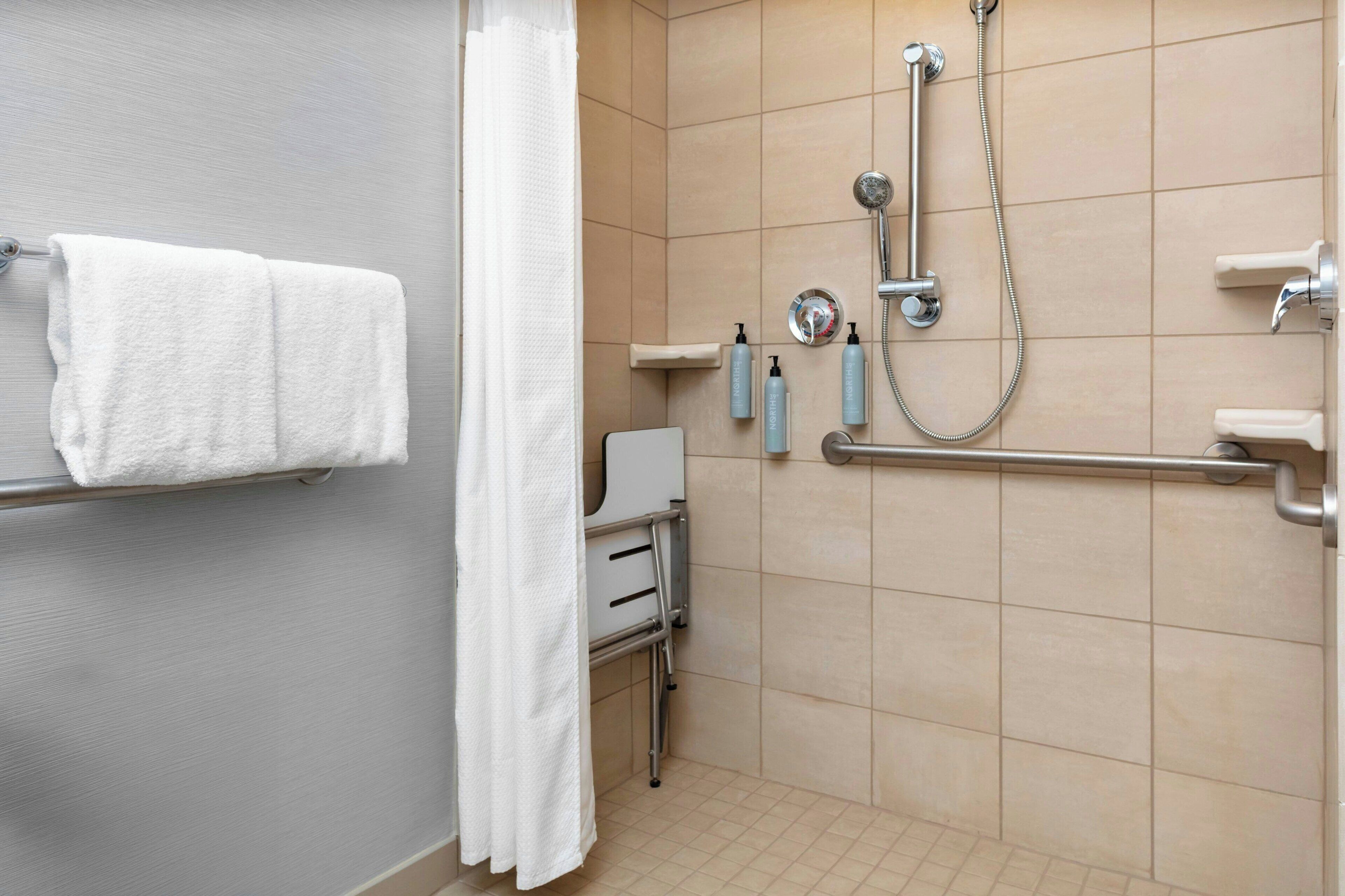 room (mobility/hearing access, roll-in shwr) | bathroom | eco-friendly toiletries, hair dryer, towels