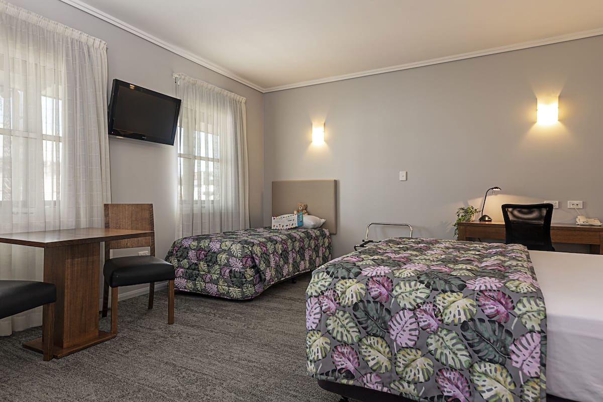 Habitación estándar (Queen/Single) | Minibar, escritorio, sistema de insonorización