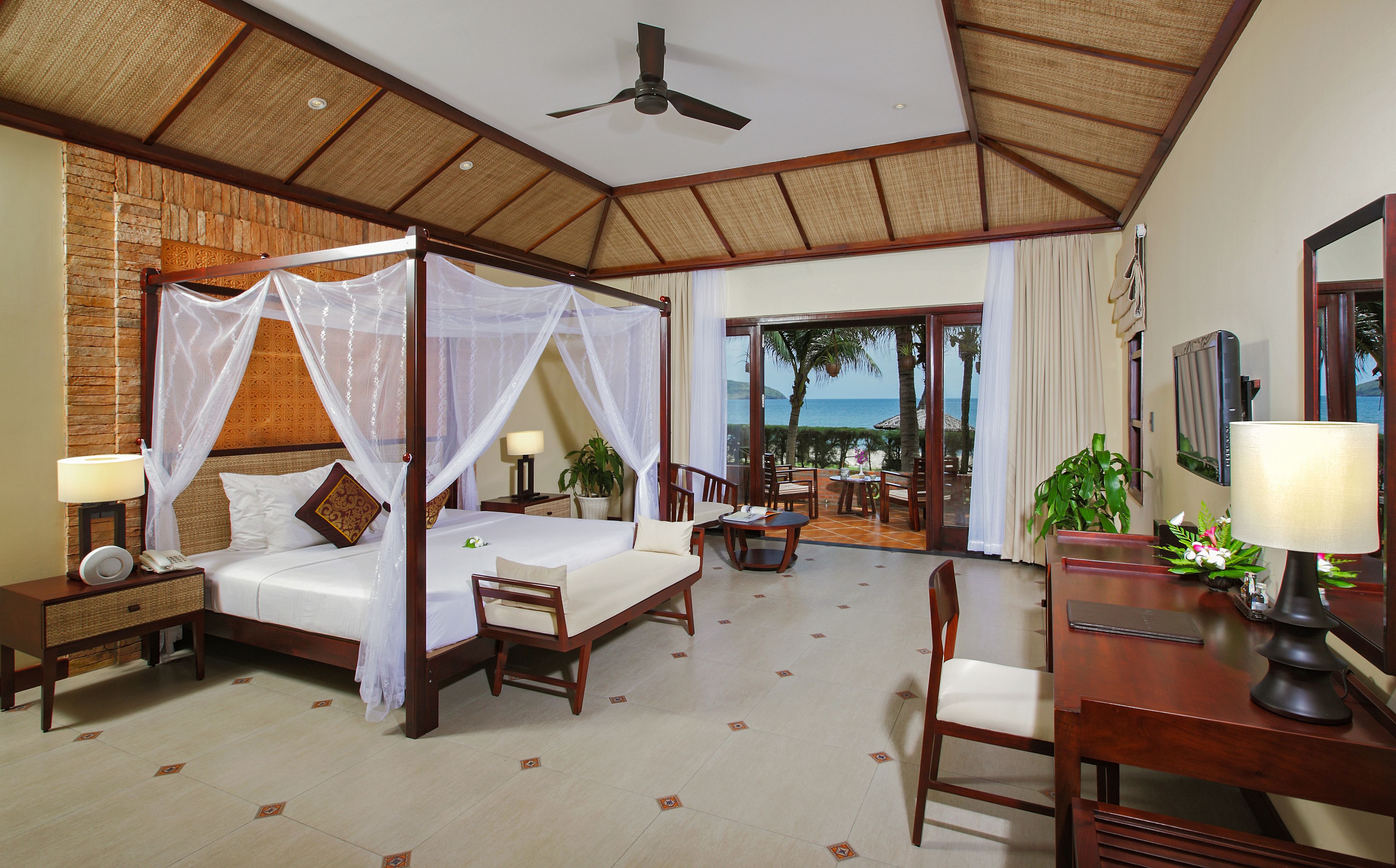 Bungalow, Sea View | Minibar, in-room safe, individually decorated, individually furnished