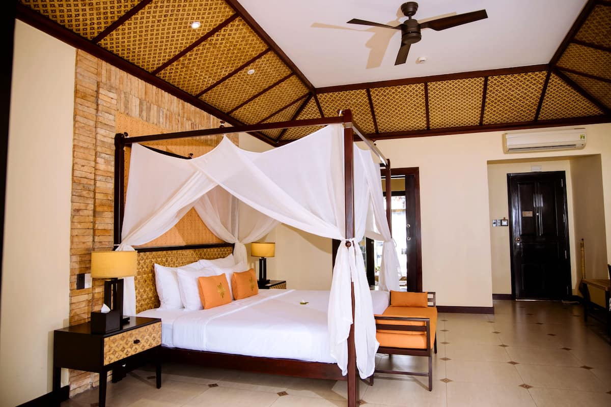 Bungalow, Sea View | Minibar, in-room safe, individually decorated, individually furnished