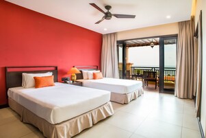 Executive Suite | Minibar, in-room safe, individually decorated, individually furnished