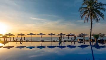 Outdoor pool, pool umbrellas, pool loungers