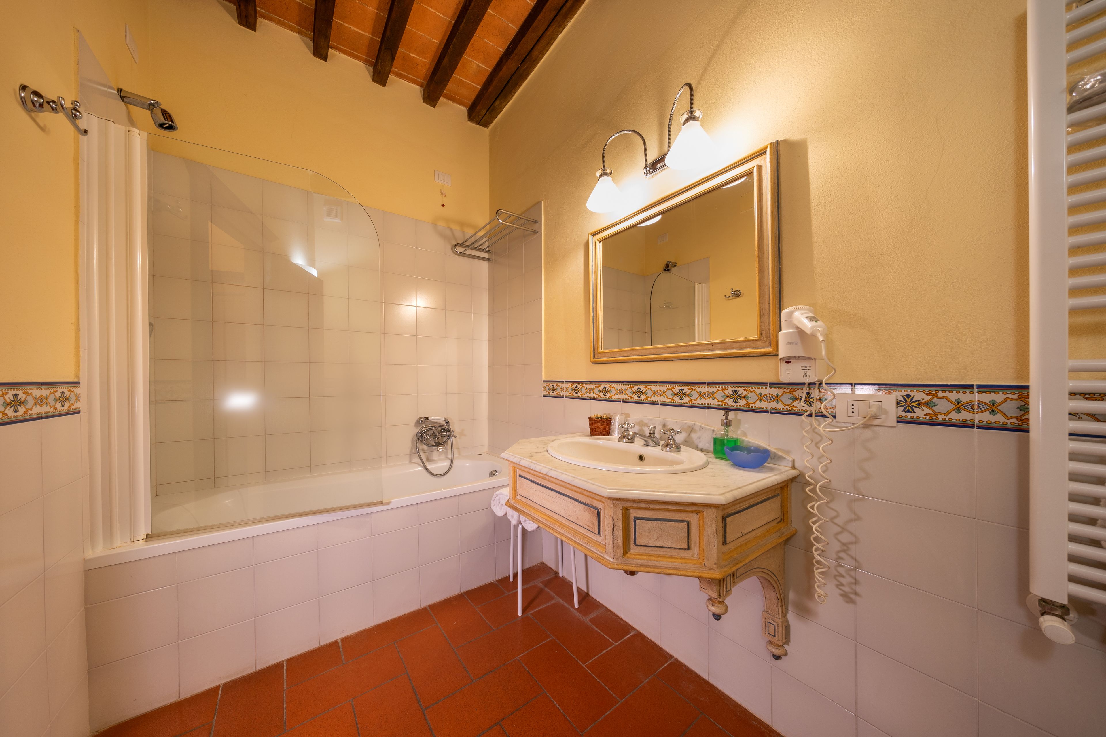 classic double room | bathroom | rainfall showerhead, free toiletries, hair dryer, bidet