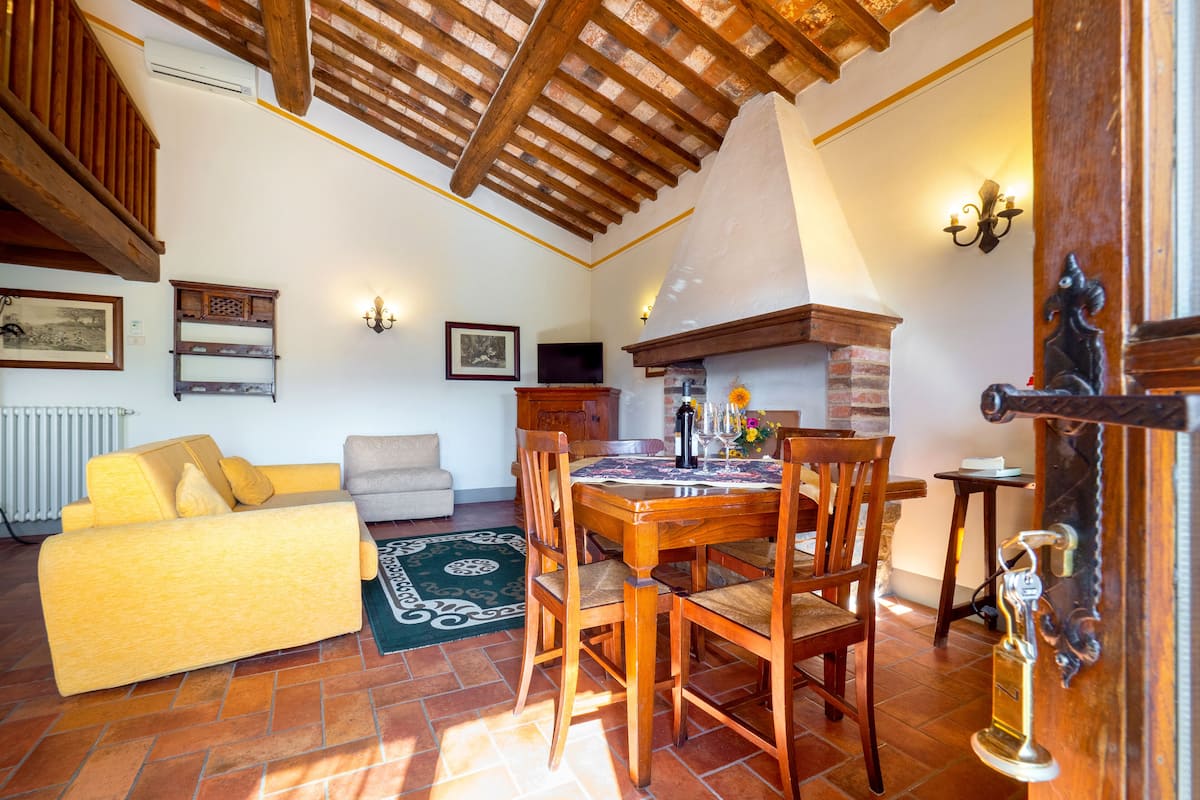 Traditional Apartment, 1 Bedroom | Living area | 32-inch flat-screen TV with digital channels, TV