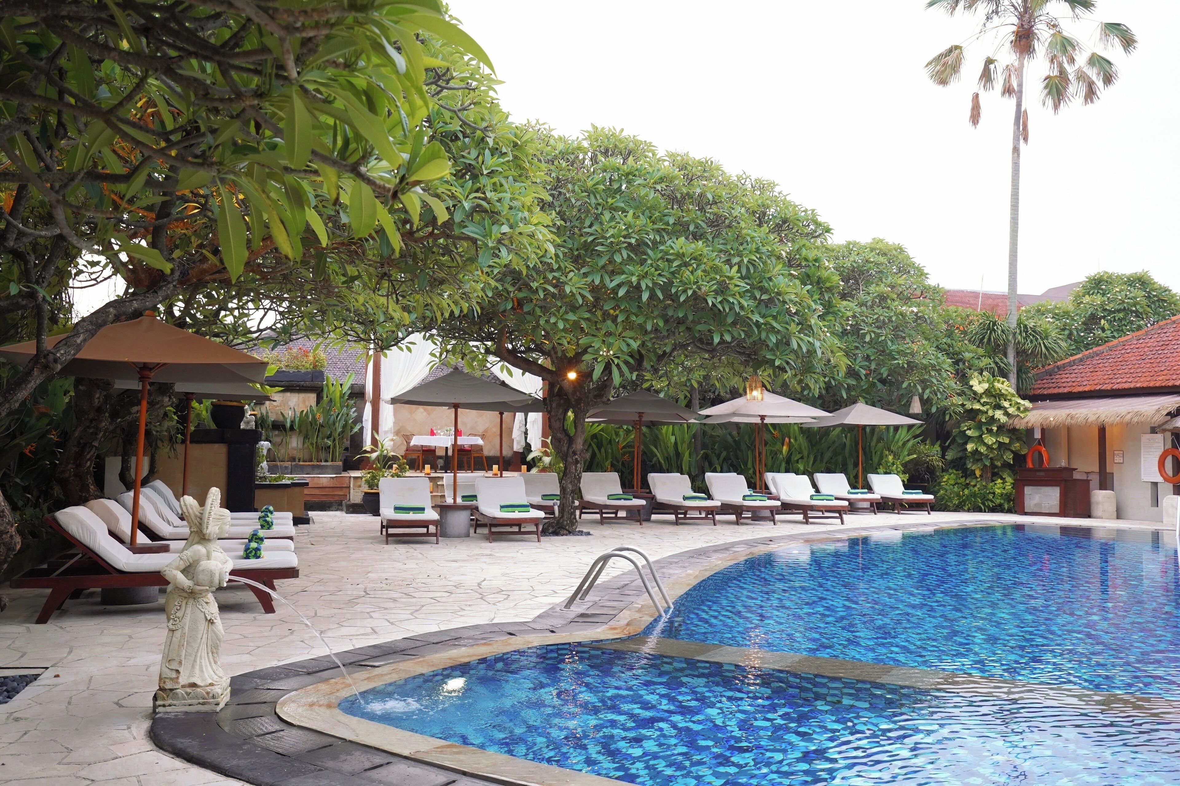 outdoor pool, open 8:00 am to 8:00 pm, pool umbrellas, pool loungers