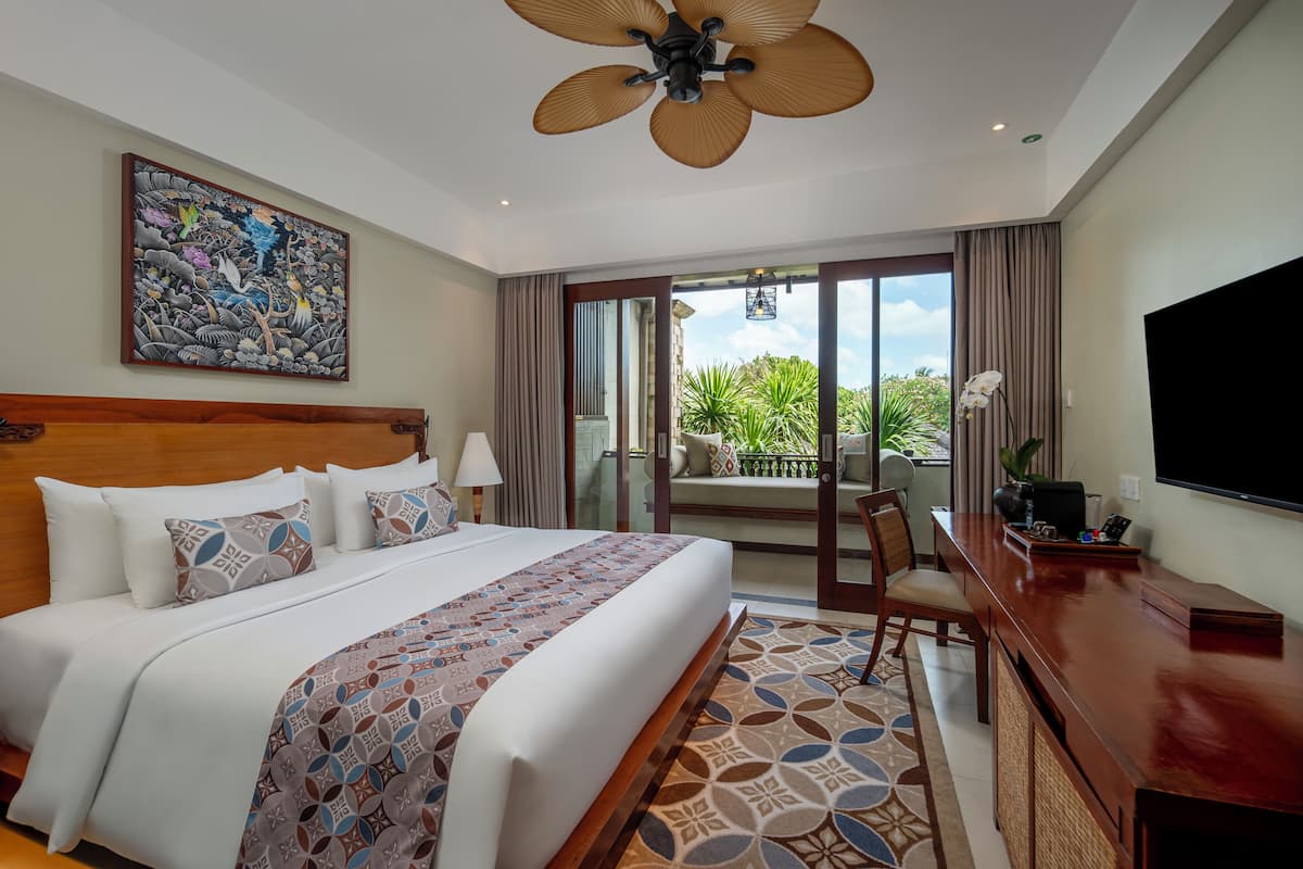 Resort Room, Garden View | Minibar, in-room safe, desk, iron/ironing board
