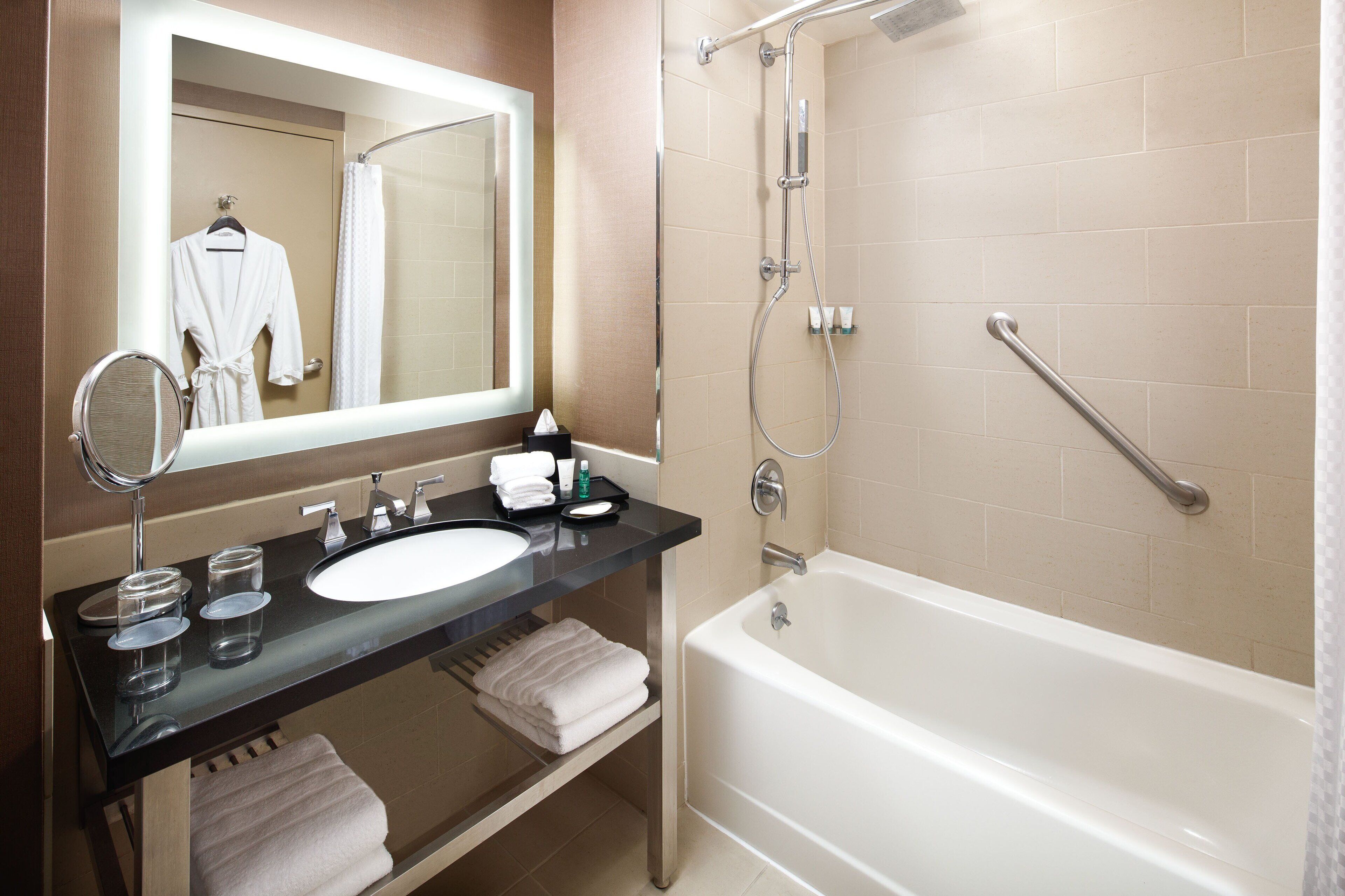 combined shower/bathtub, rainfall showerhead, designer toiletries