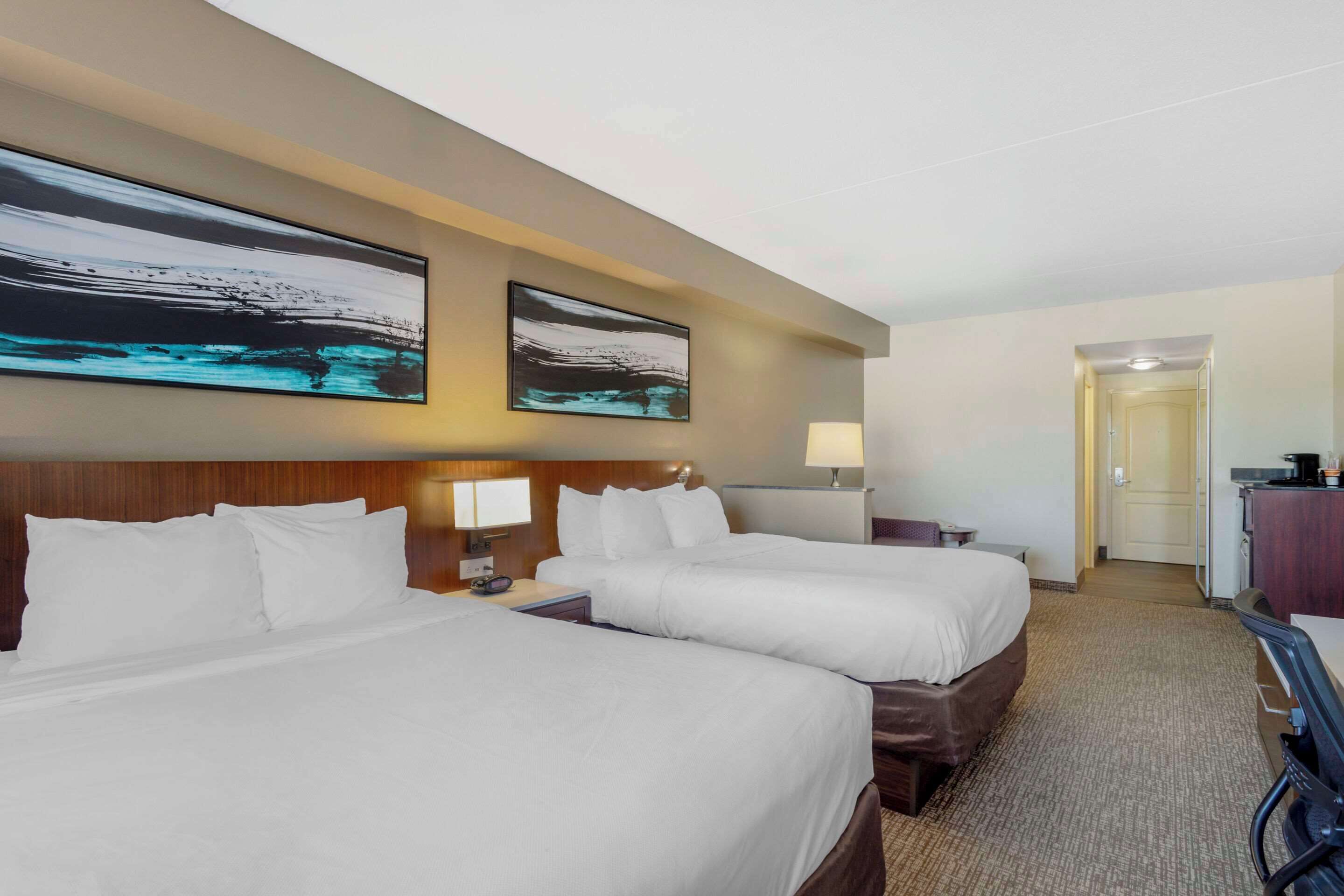 Suite, 2 Queen Beds & Sofa Bed, Non-Smoking | Down duvets, desk, laptop workspace, blackout curtains