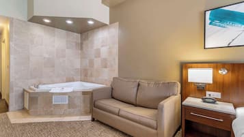 Suite, 1 King Bed, Non Smoking, Hot Tub | Down comforters, desk, laptop workspace, blackout drapes