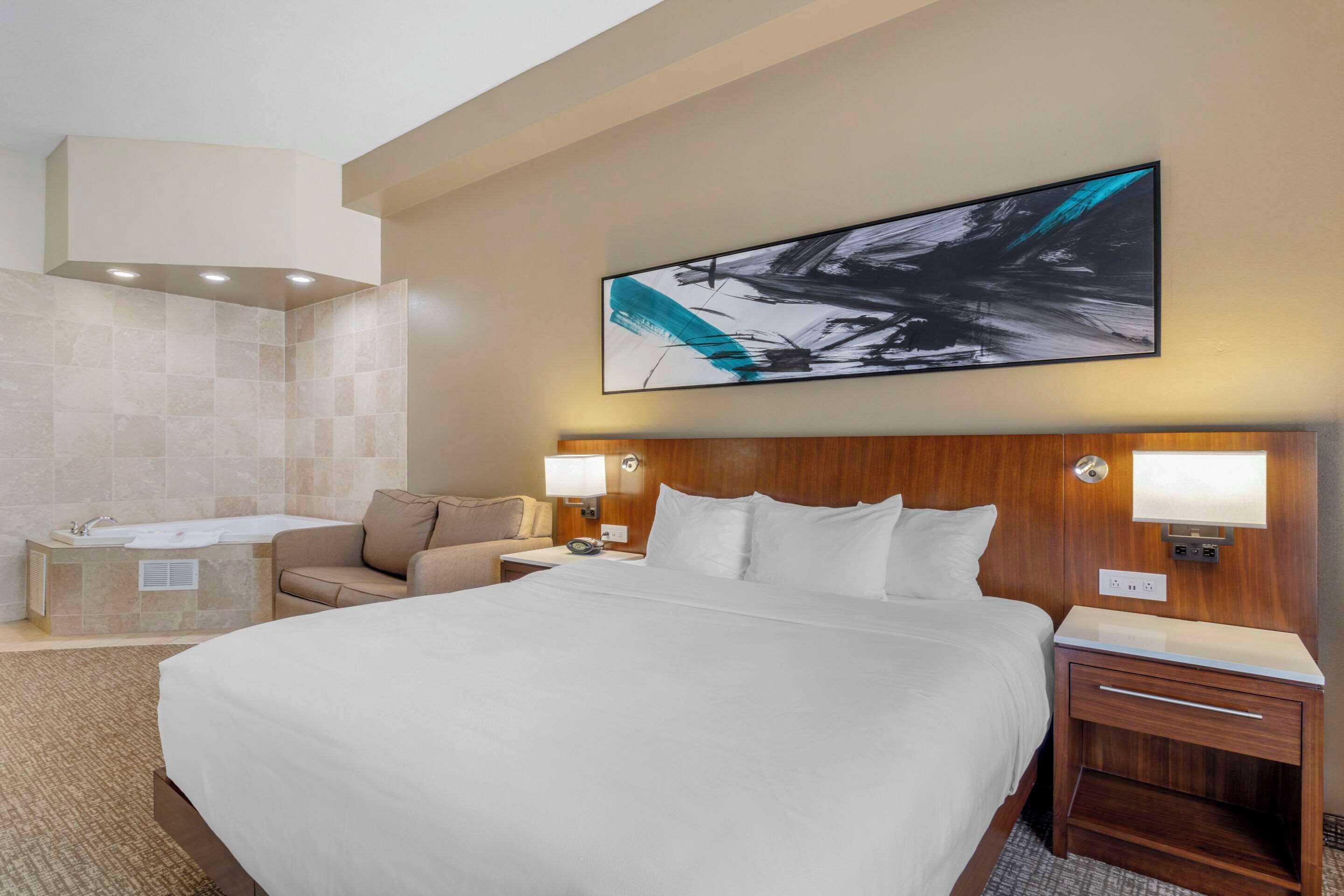 suite, 1 king bed, non smoking, hot tub | down duvets, desk, laptop workspace, blackout curtains