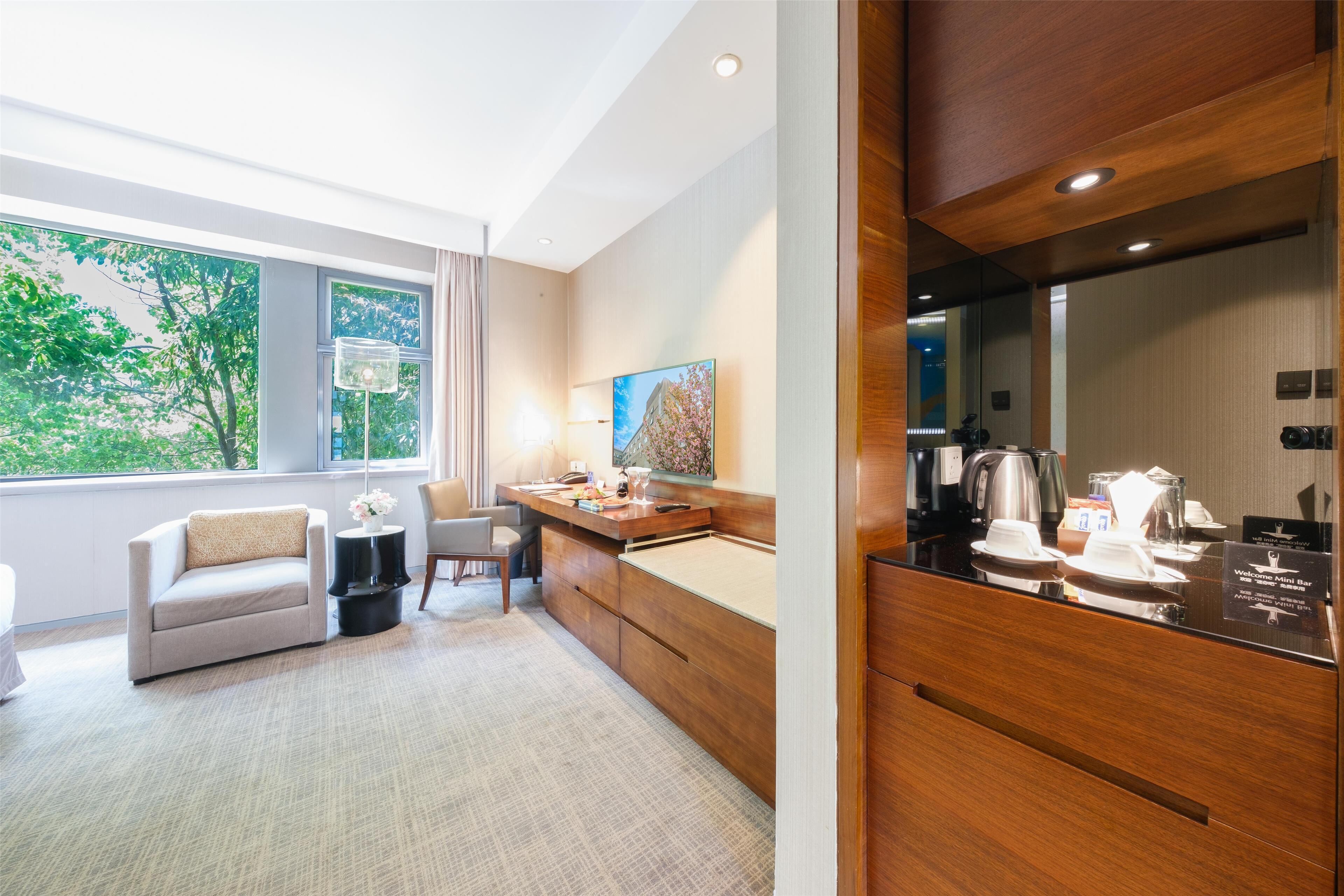 premium bedding, down duvets, memory-foam beds, minibar