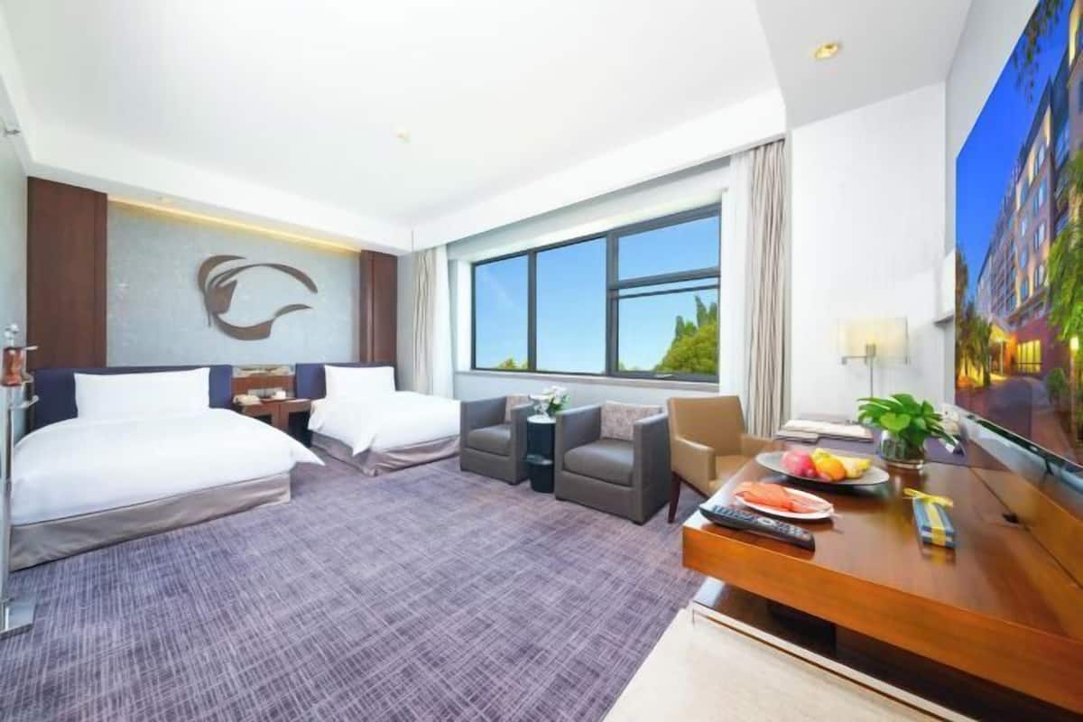 Premium bedding, down comforters, memory foam beds, minibar