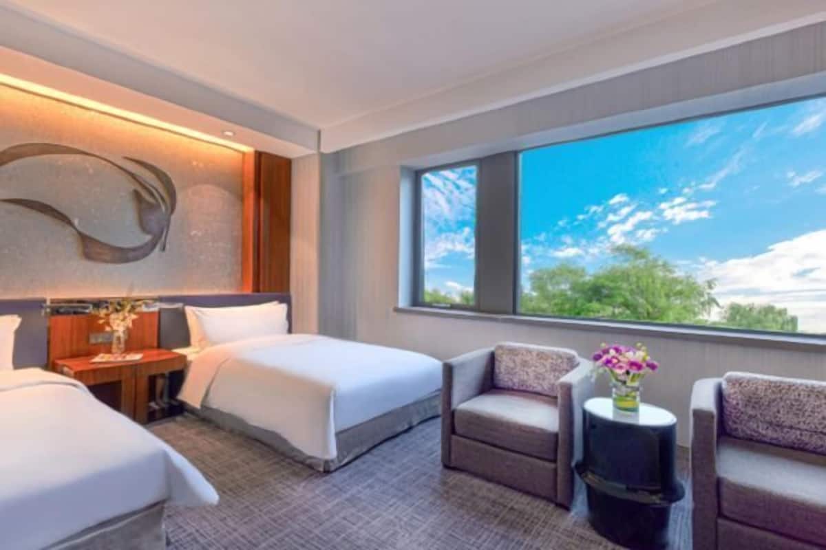 Premium bedding, down duvets, memory-foam beds, minibar