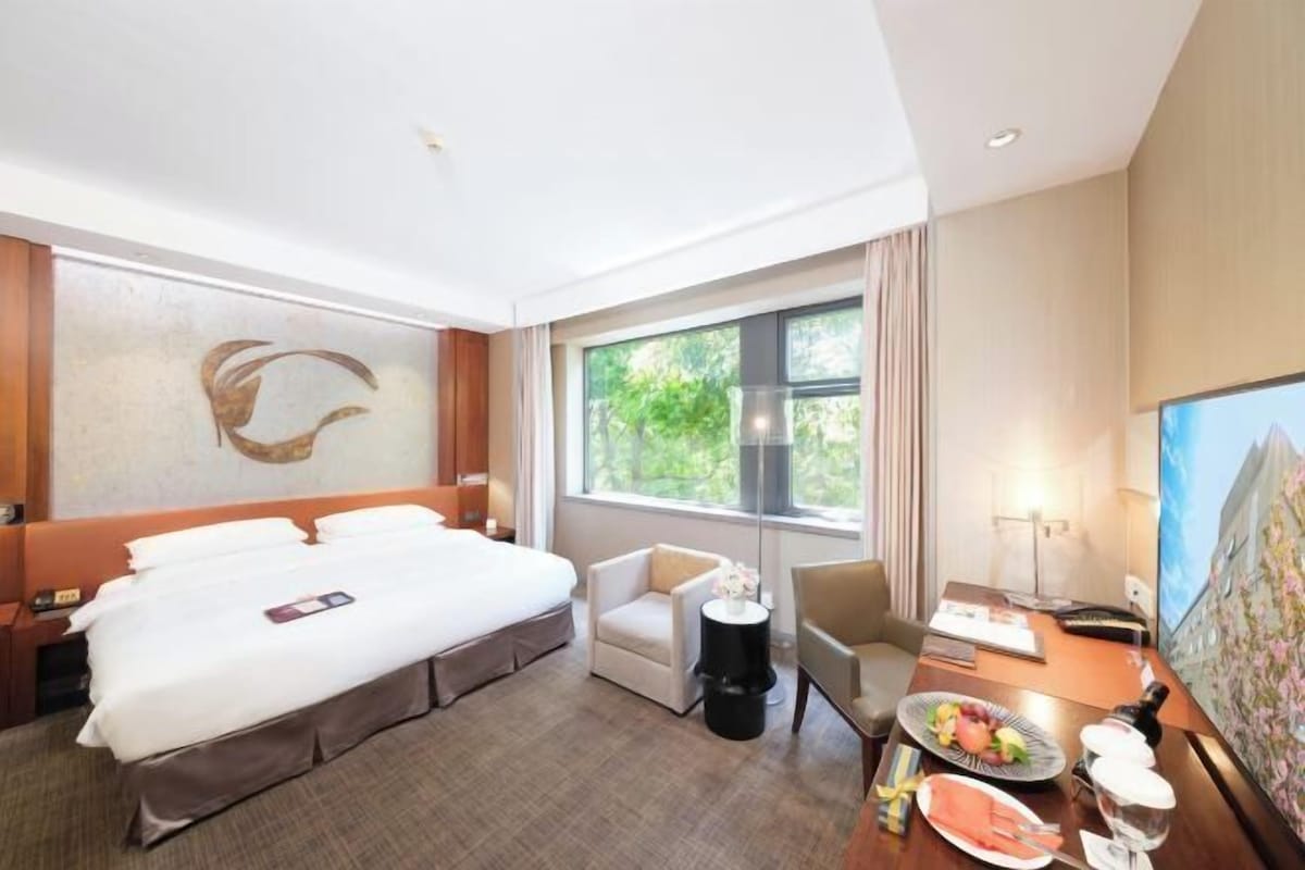 Premium bedding, down comforters, memory foam beds, minibar