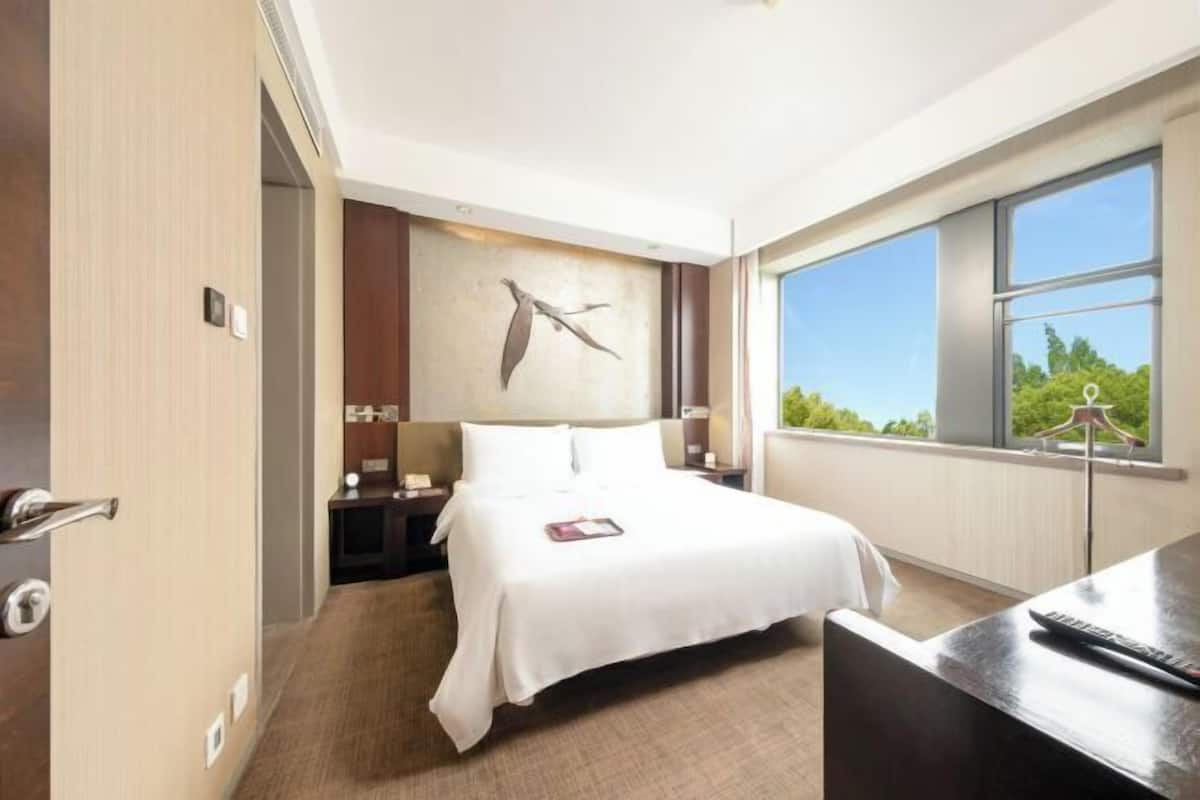 Premium bedding, down comforters, memory foam beds, minibar
