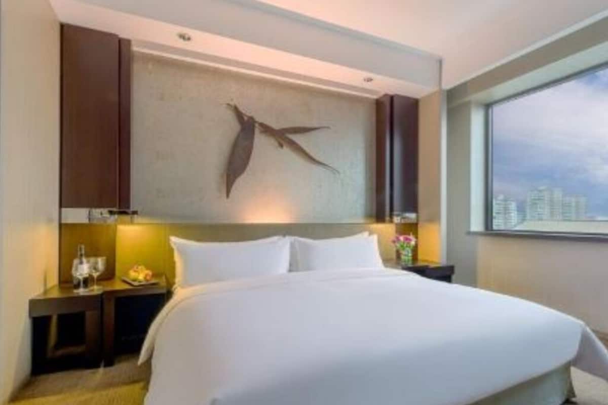 Premium bedding, down comforters, memory foam beds, minibar