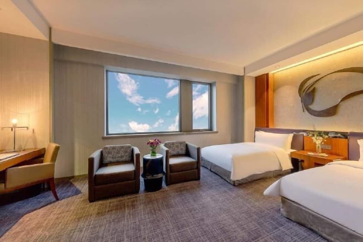 Premium bedding, down duvets, memory-foam beds, minibar