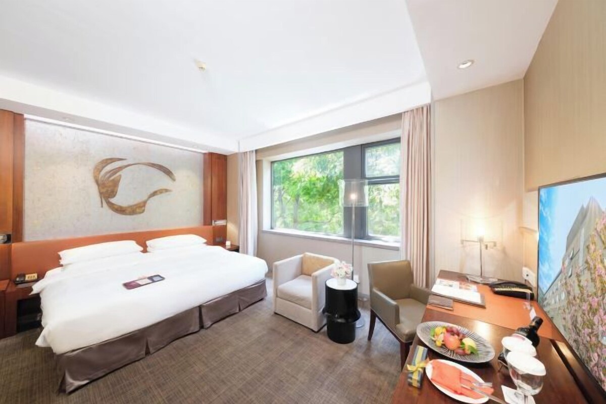 Premium bedding, down comforters, memory foam beds, minibar