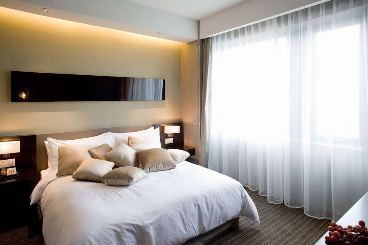 Premium bedding, down comforters, memory foam beds, minibar