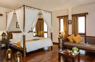 Deluxe Cottage | Minibar, blackout drapes