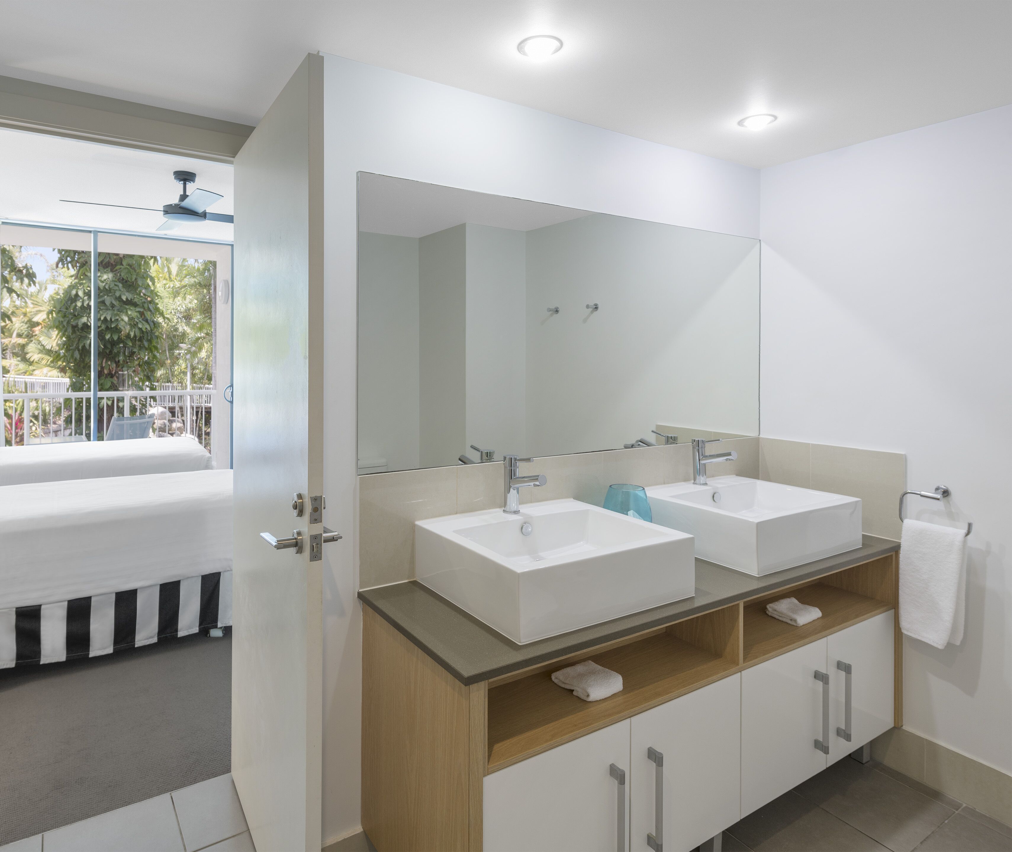 1 bedroom pool view | bathroom | shower, free toiletries, hair dryer, towels