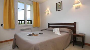 Premium bedding, blackout drapes, soundproofing, iron/ironing board