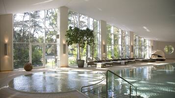 Indoor pool, open 7:00 AM to 9:00 PM, pool loungers