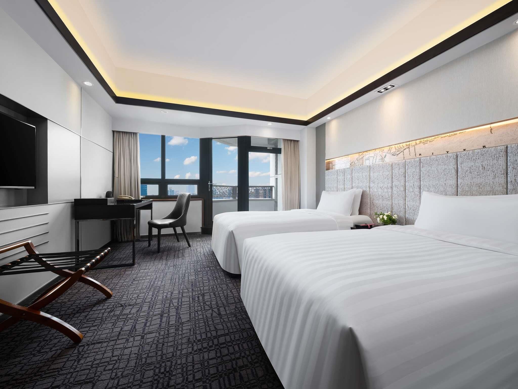 Habitación superior, 2 camas individuales, vista a la ciudad | Ropa de cama de alta calidad y minibar 