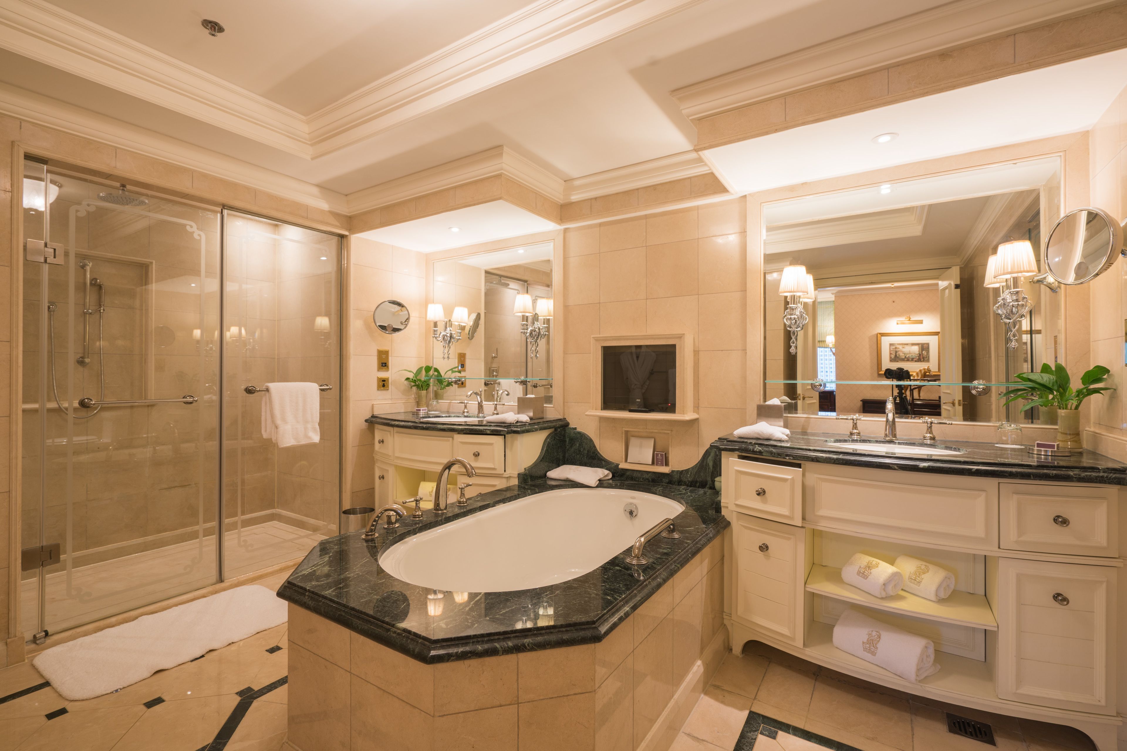 separate bathtub and shower, jetted bath, rainfall showerhead