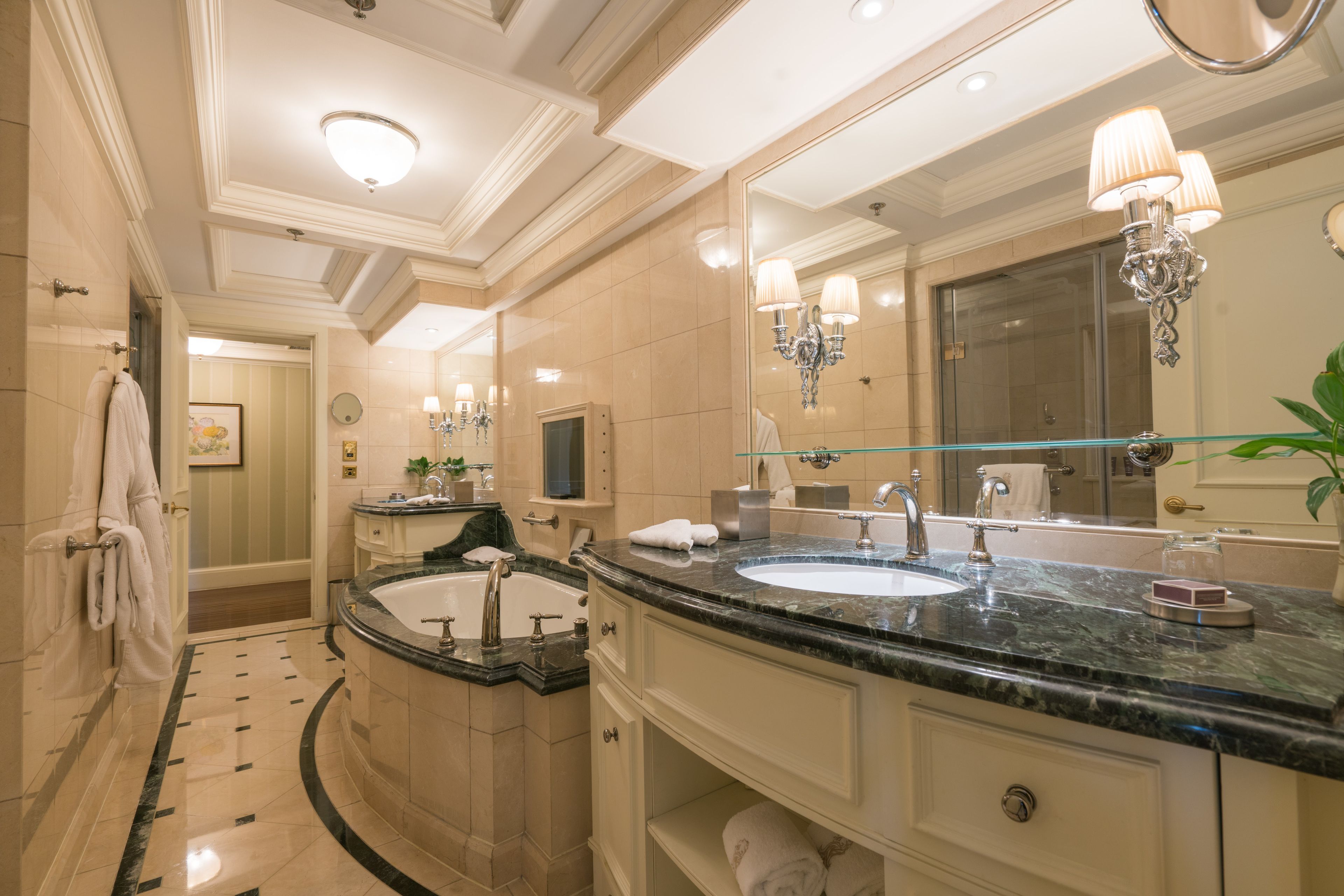 separate bathtub and shower, jetted bath, rainfall showerhead