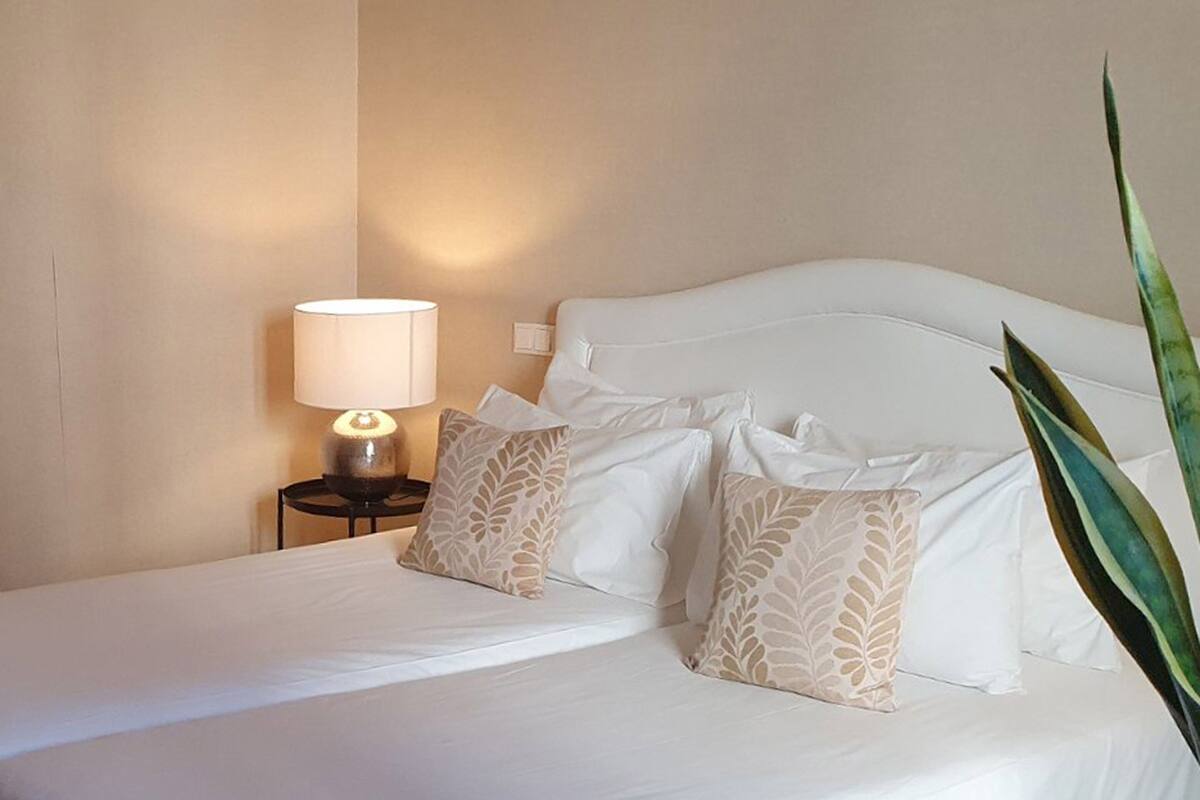 superior twin room, pool view | minibar, in-room safe, blackout curtains, soundproofing