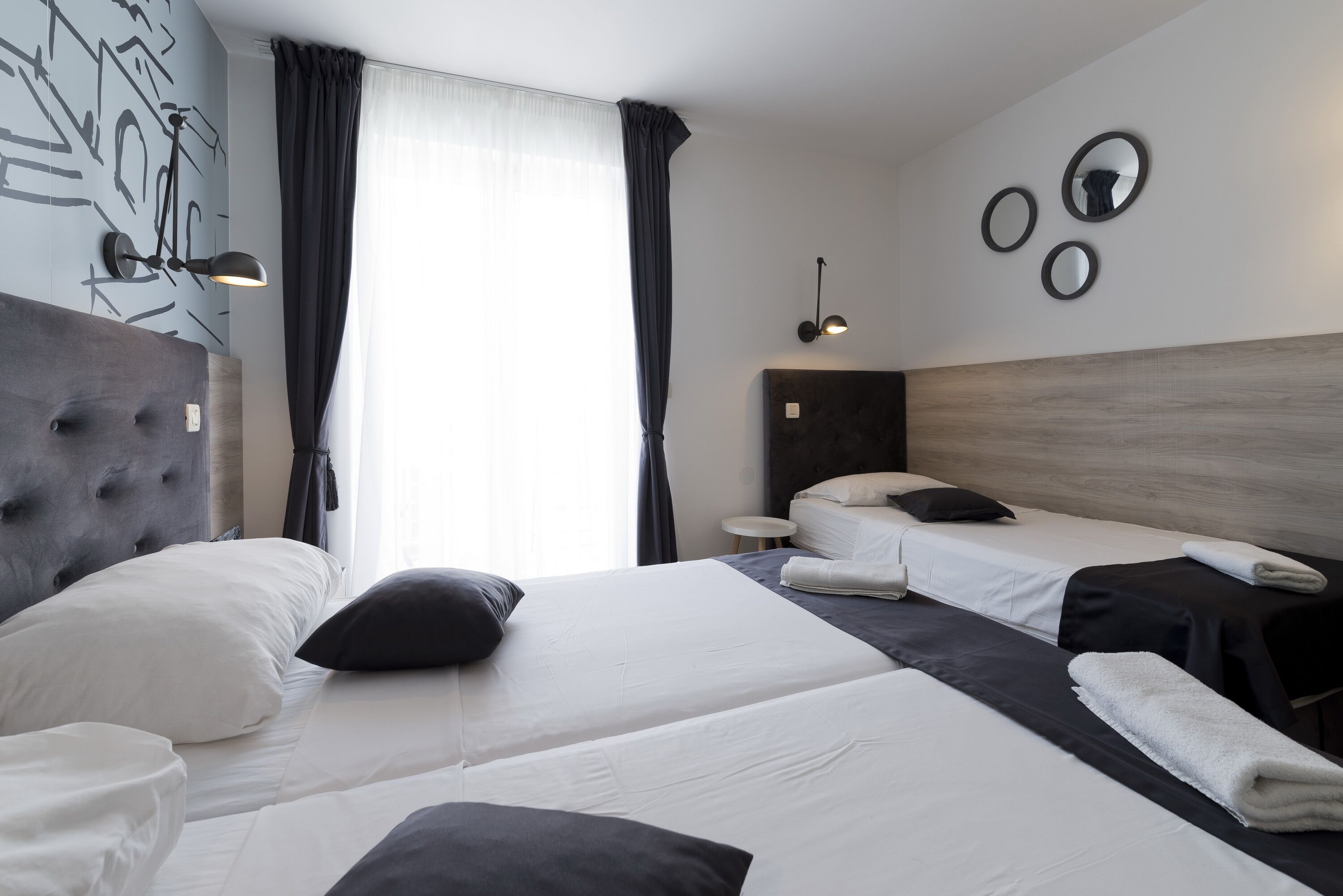 triple room, balcony | minibar, in-room safe, desk, blackout curtains