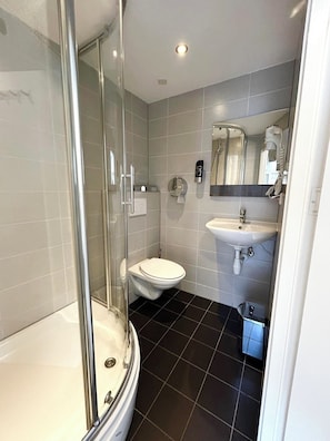 Shower, free toiletries, hair dryer, towels