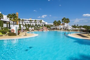 Indoor pool, outdoor pool, pool umbrellas, sun loungers