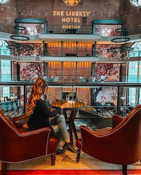 Sitting area in hotel lobby at The Liberty, a Marriott Luxury Collection Hotel, Boston
