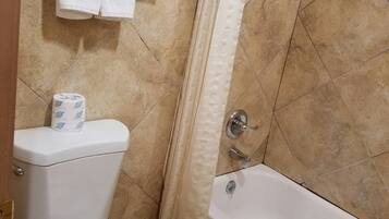 Bathtub, free toiletries, hair dryer, towels