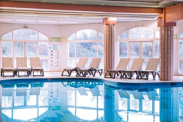 Indoor pool, open 8:30 AM to 7:30 PM, pool loungers