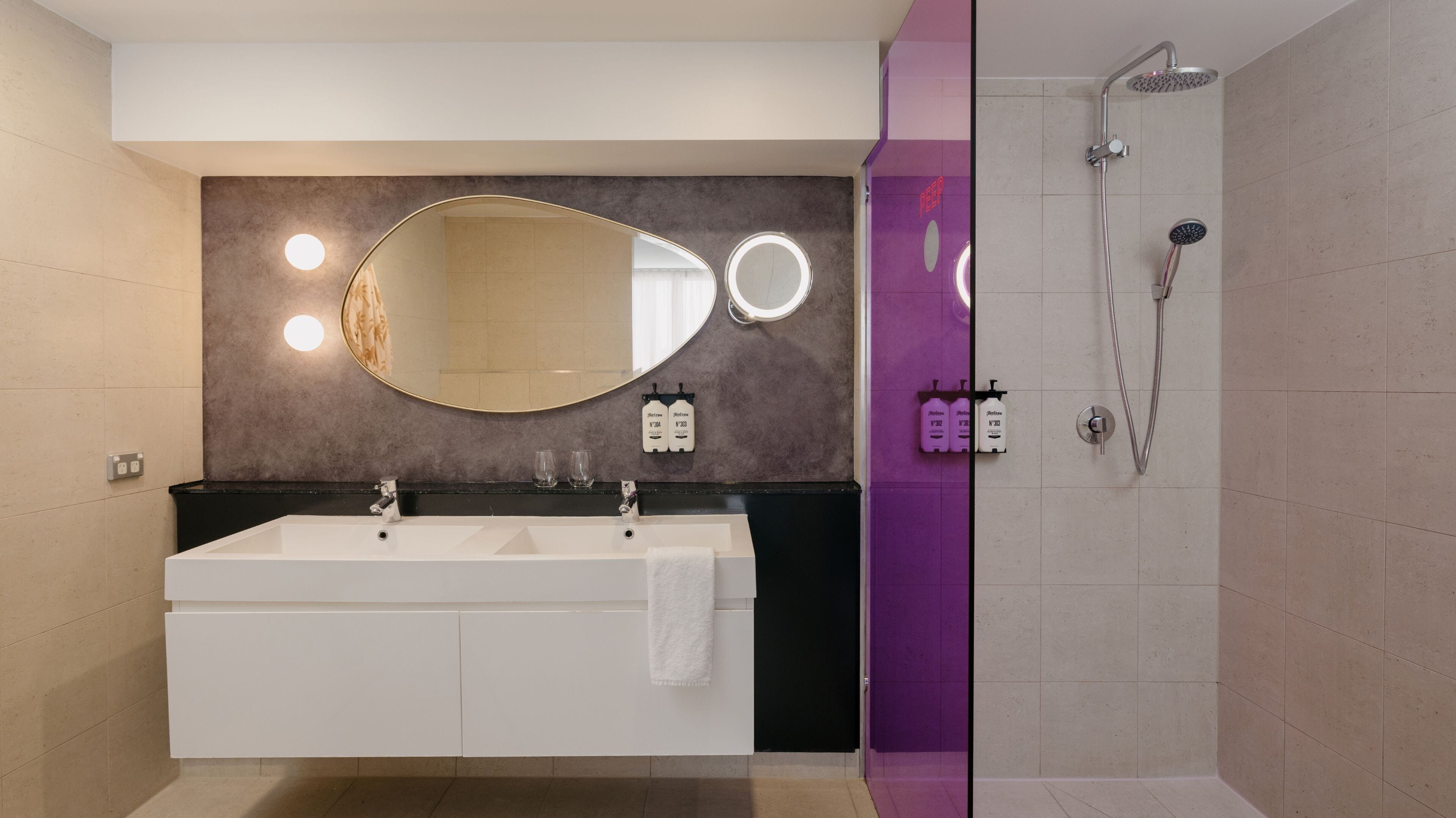 shower, rainfall showerhead, designer toiletries, hair dryer