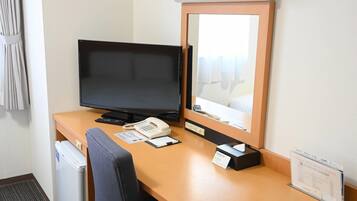 Desk, laptop workspace, blackout curtains, soundproofing