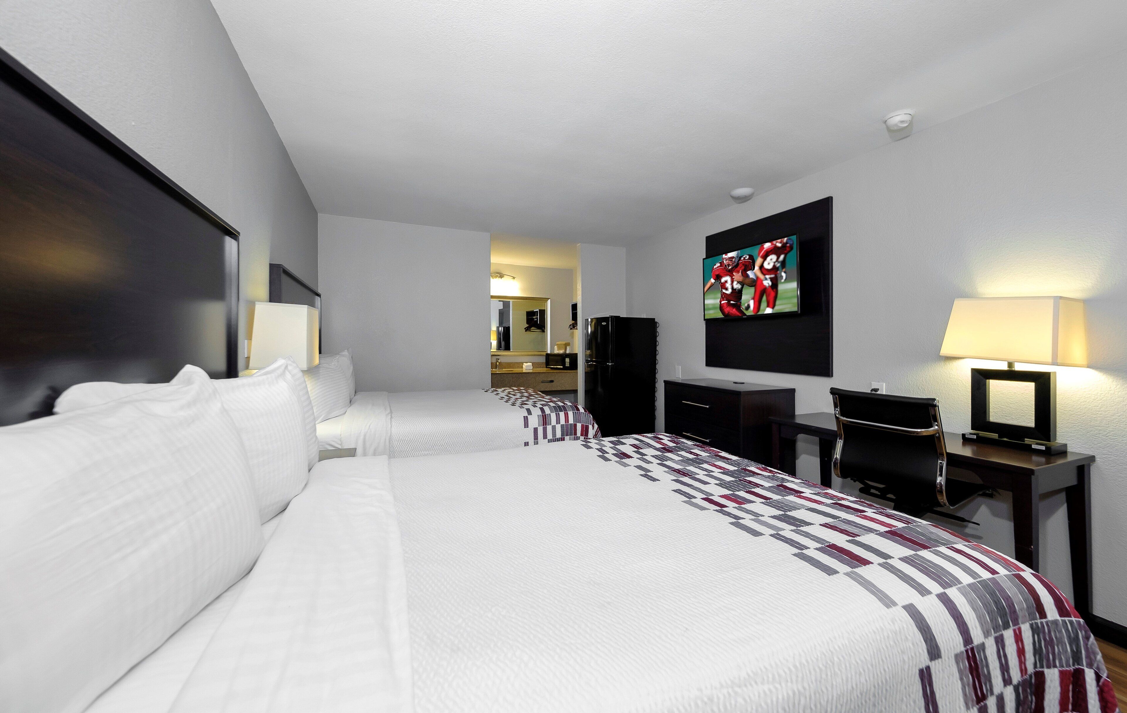 Desk, laptop workspace, blackout curtains, free cots/infant beds