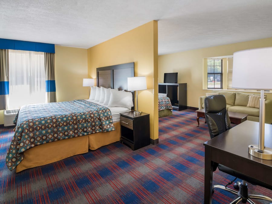 Suite, 1 King Bed | Iron/ironing board, cribs/infant beds, rollaway beds, free WiFi