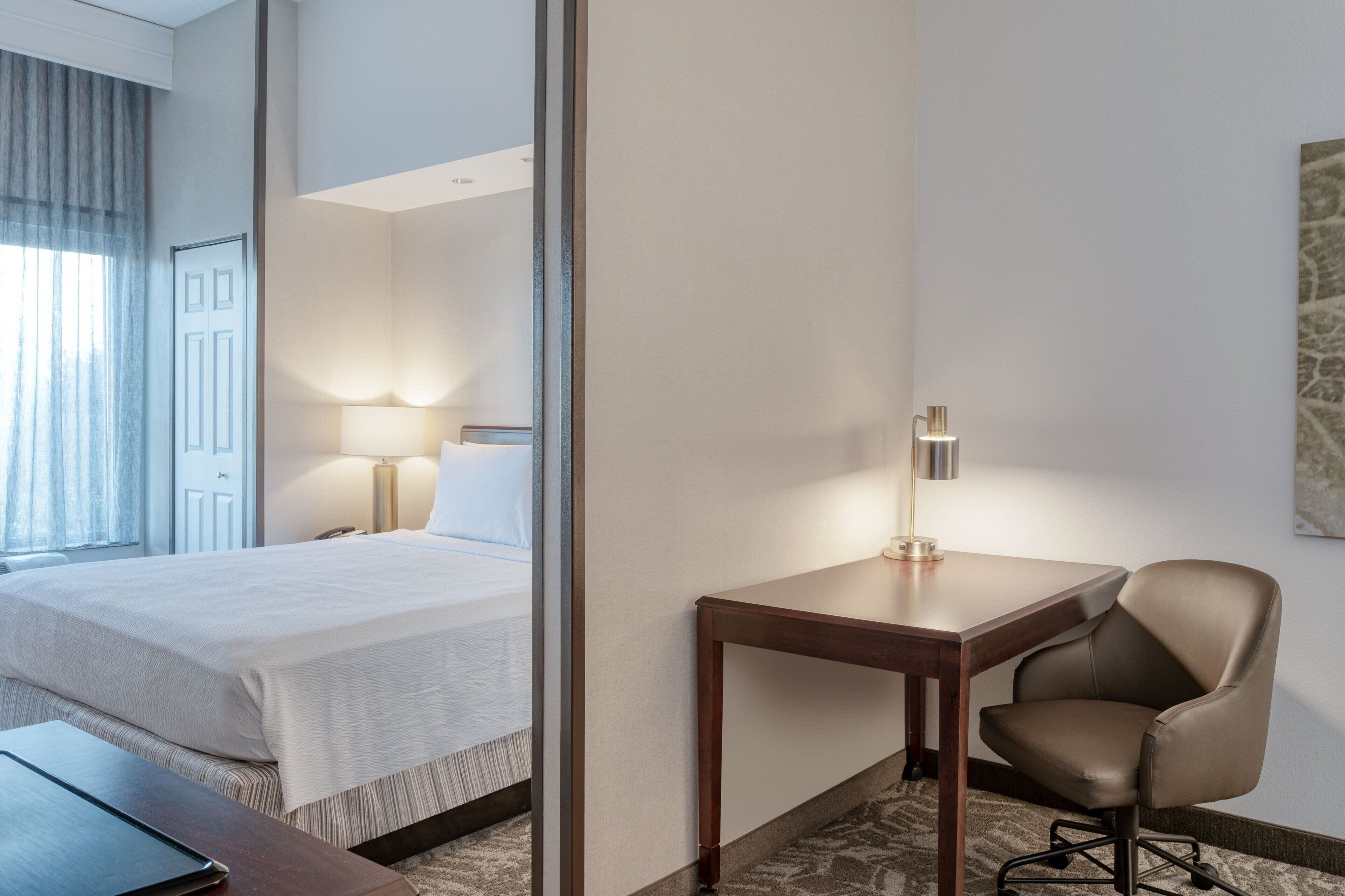 premium bedding, desk, blackout curtains, iron/ironing board