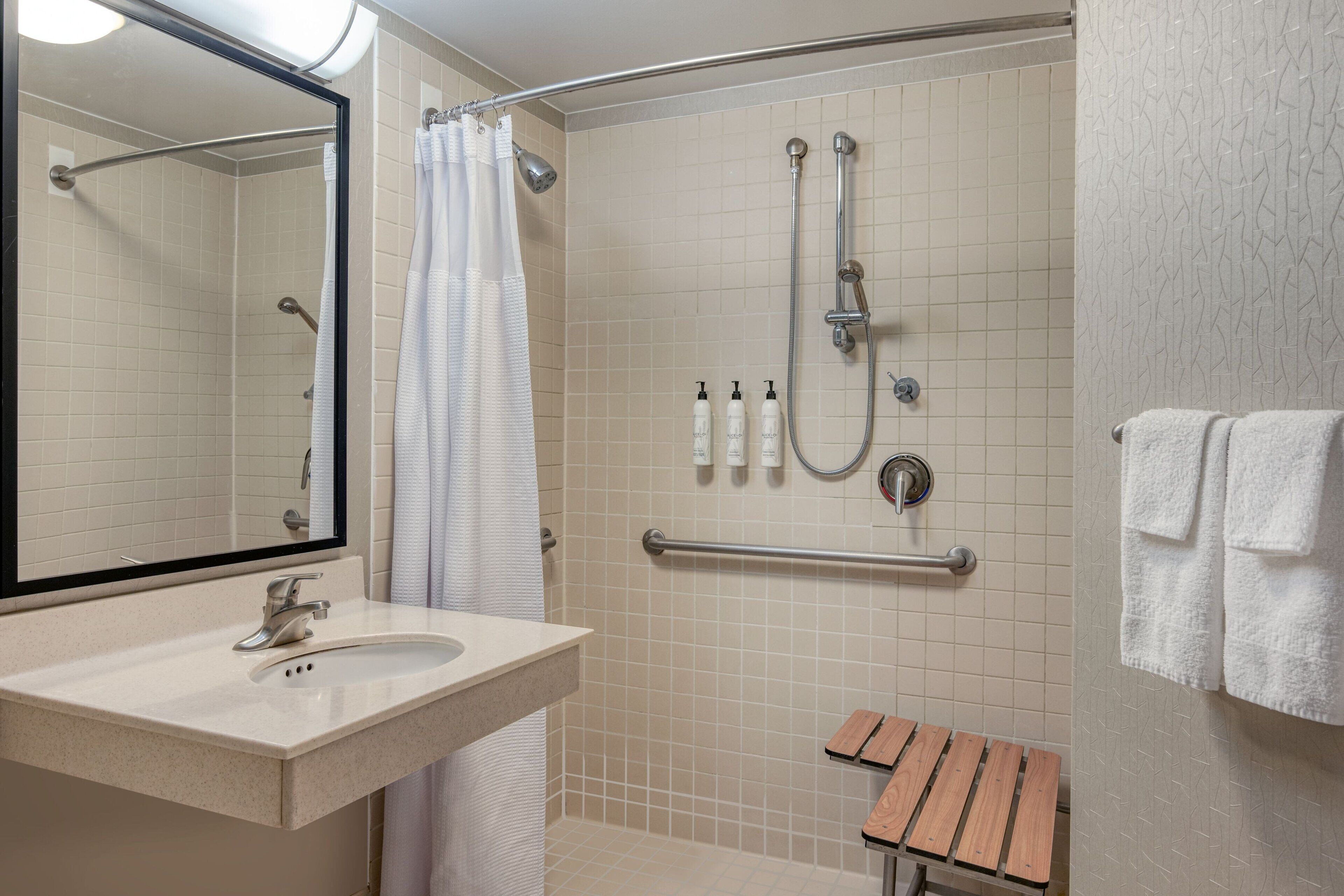 combined shower/bathtub, free toiletries, hair dryer, towels