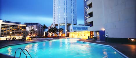 Outdoor pool, pool umbrellas, sun loungers