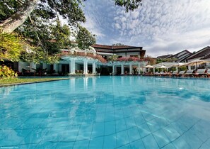 Outdoor pool, pool umbrellas, pool loungers