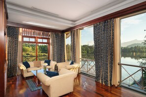 One-Bedroom River Suite | Living area | 32-inch LCD TV with satellite channels, TV - Mahaweli Reach Hotel (Kandy)